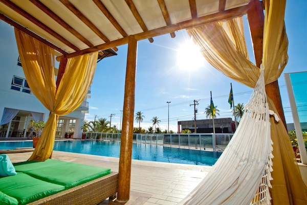 Outdoor pool, open 8 AM to 10 PM, sun loungers