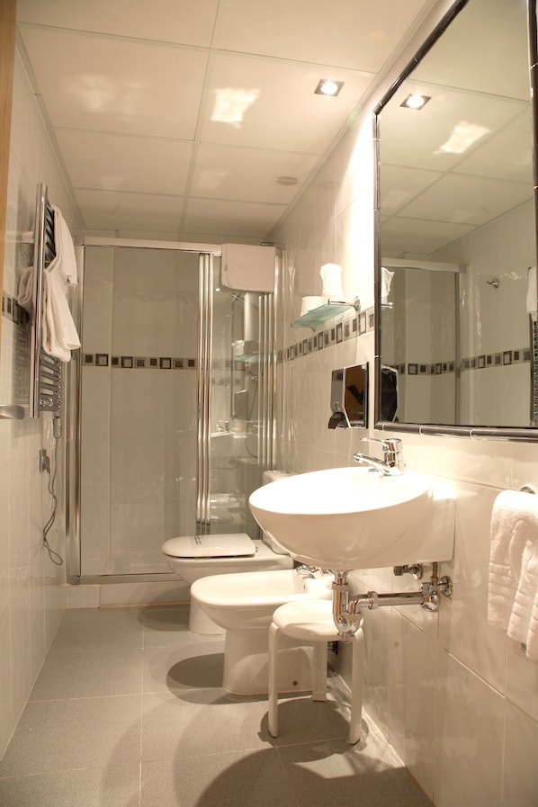 Shower, free toiletries, hair dryer, towels