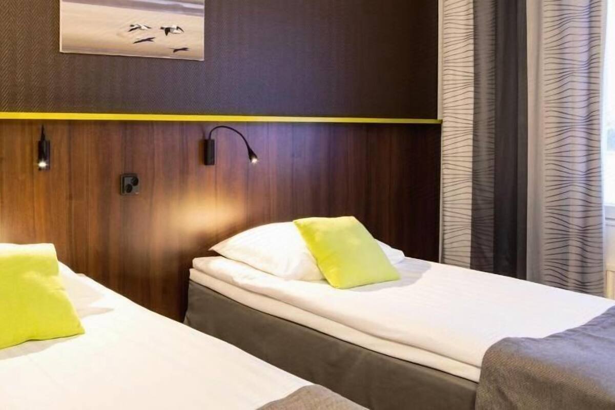 Premium bedding, desk, blackout curtains, soundproofing