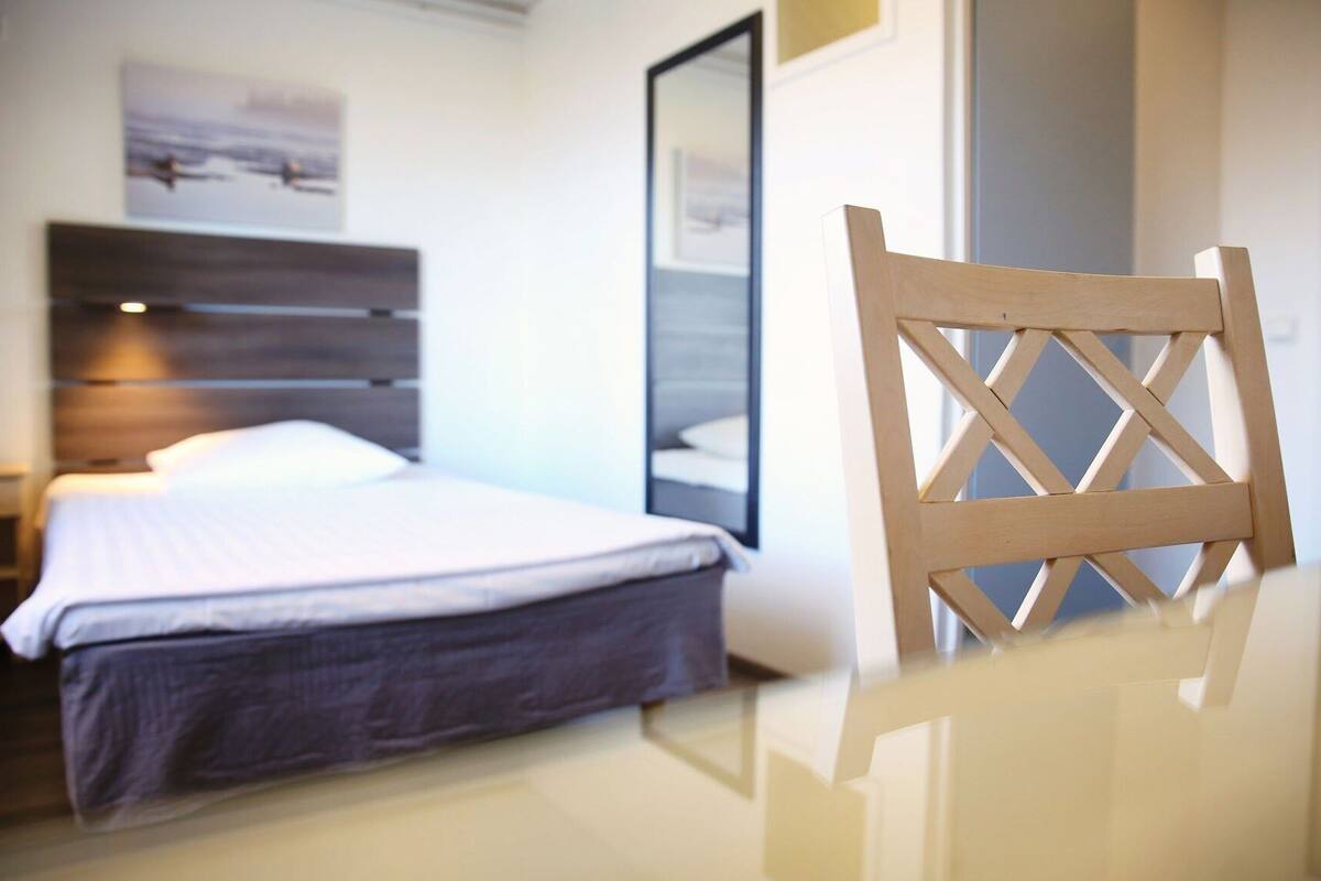 Premium bedding, desk, blackout curtains, soundproofing