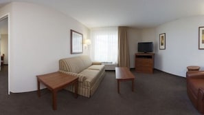 Suite, 1 chambre, cuisine (1 King, Living Area) | Aire de séjour | Téléviseur ACL de 42 po avec télévision par câble, téléviseur