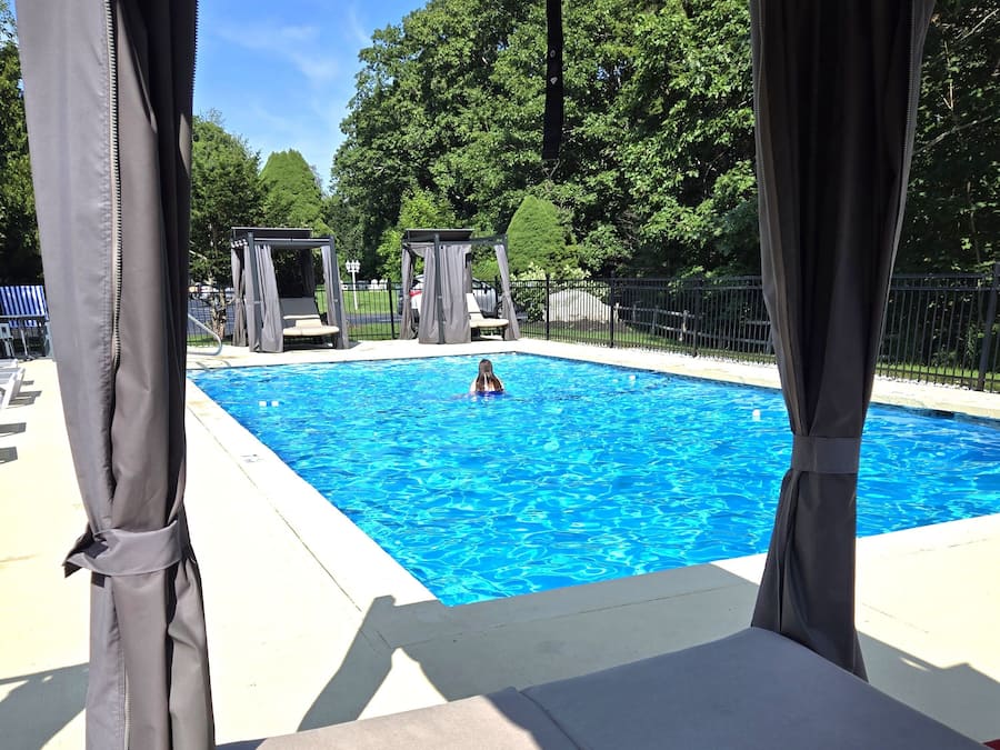 Seasonal outdoor pool, pool loungers