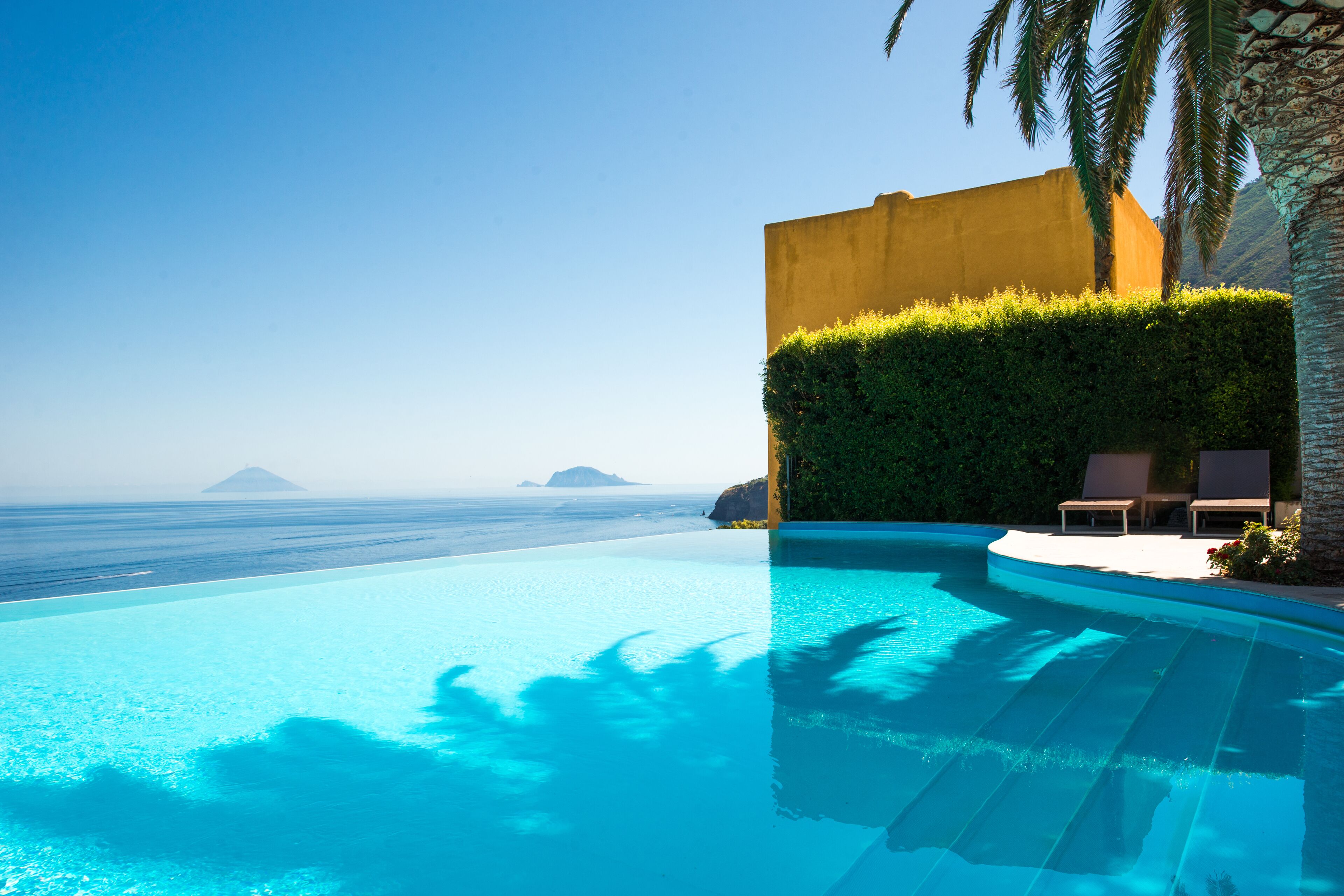 seasonal outdoor pool, pool umbrellas, pool loungers