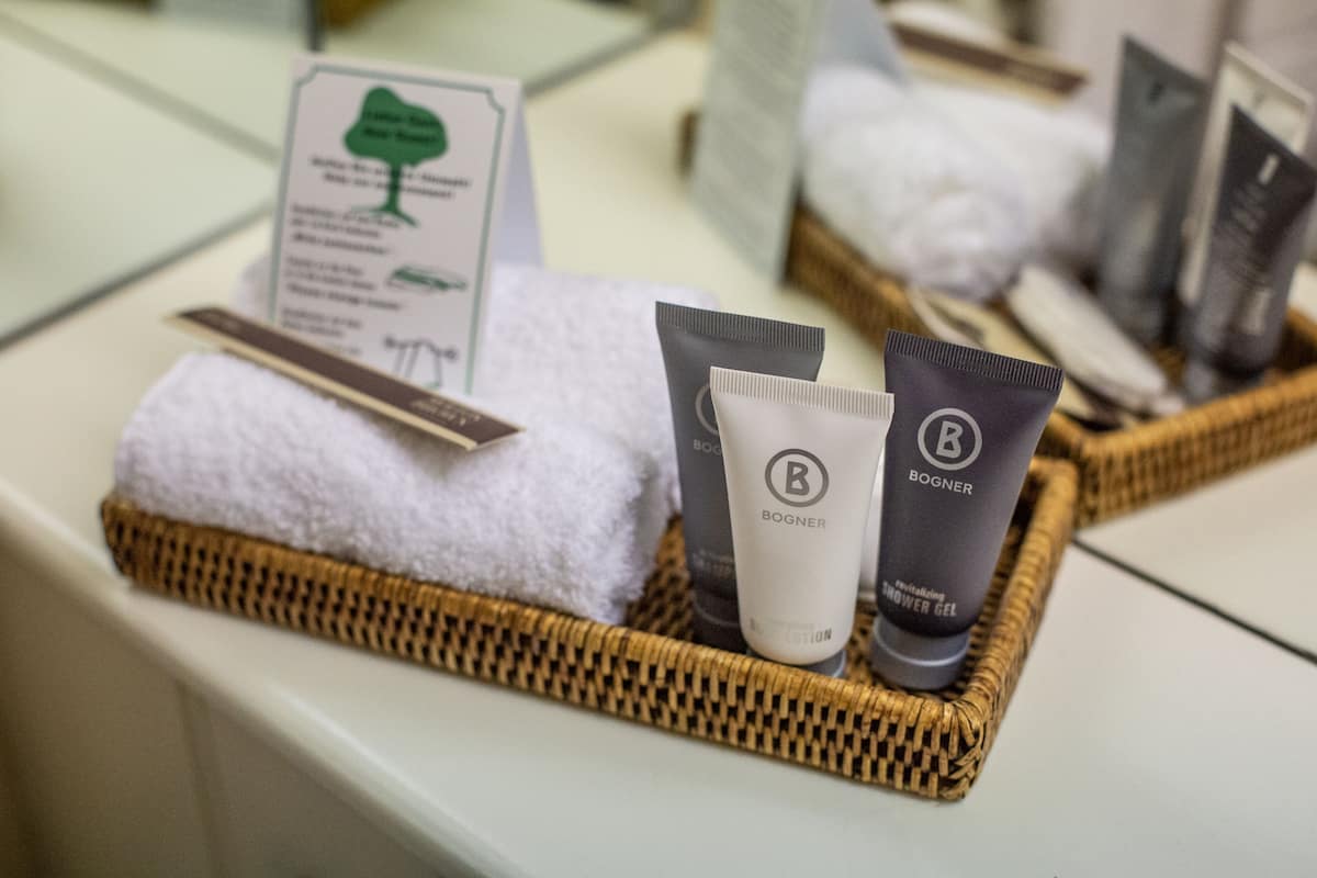 deluxe suite | bathroom | free toiletries, hair dryer, slippers, towels