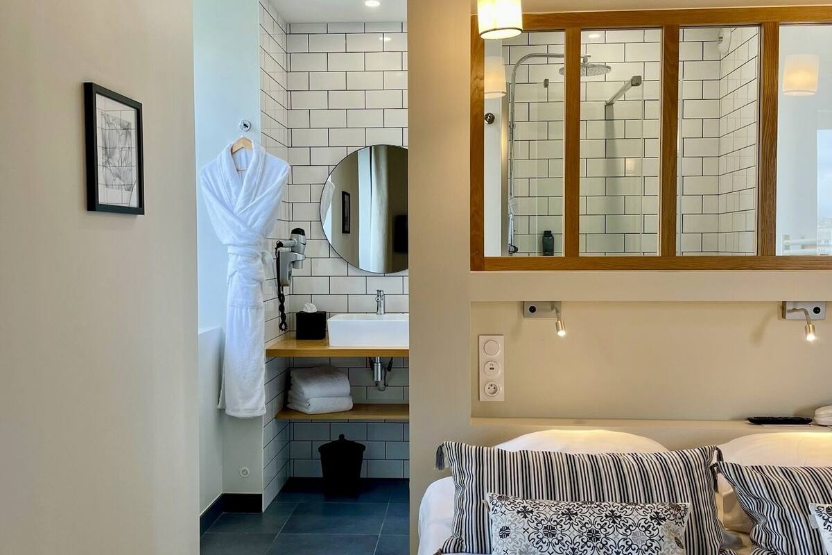 superior triple room, sea view | premium bedding, in-room safe, desk, laptop workspace