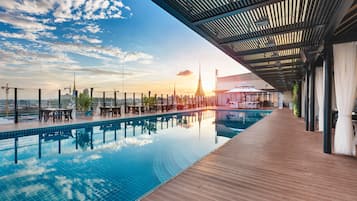 Outdoor pool, open 8:00 AM to 10:00 PM, sun loungers