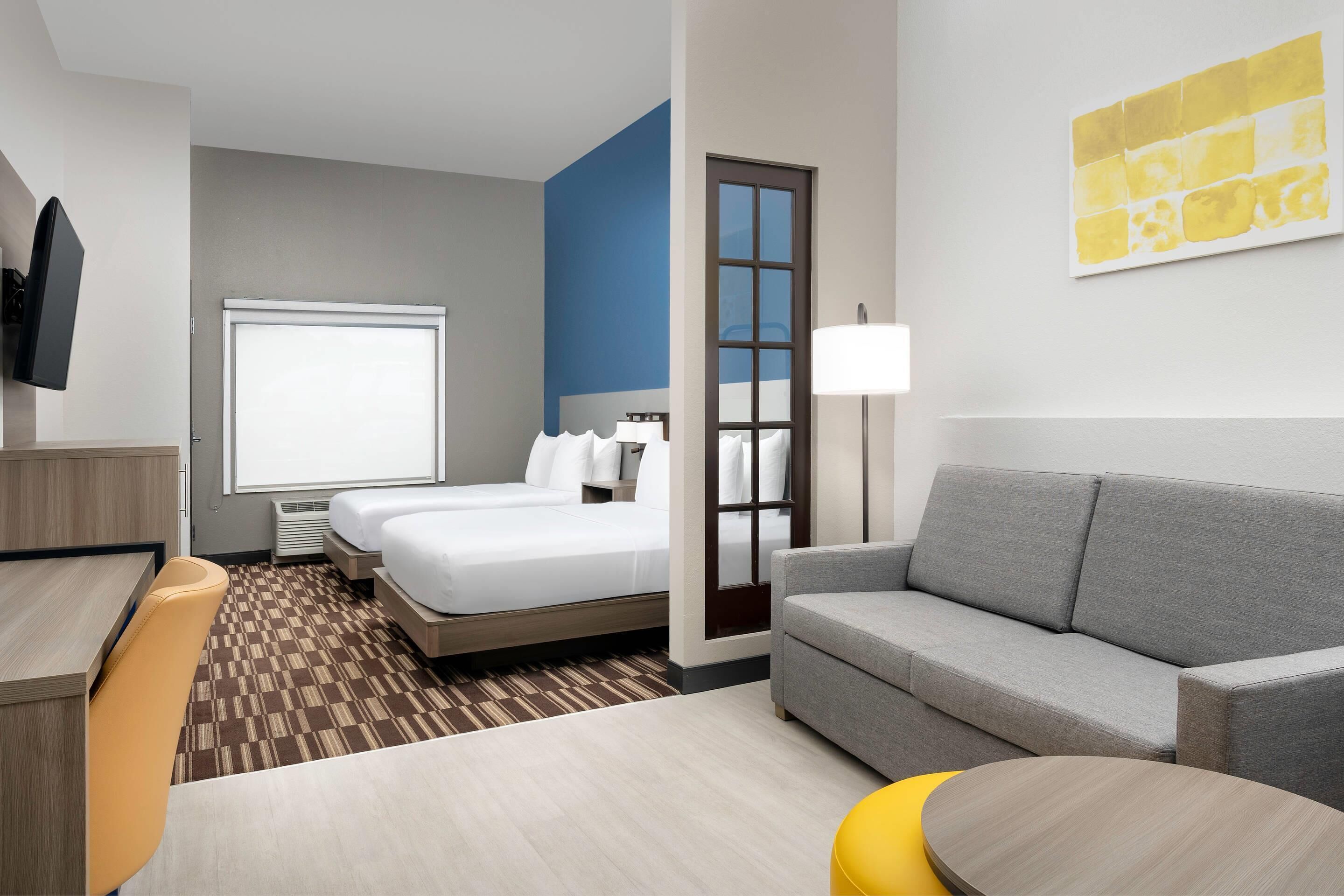 pillow-top beds, desk, laptop workspace, iron/ironing board