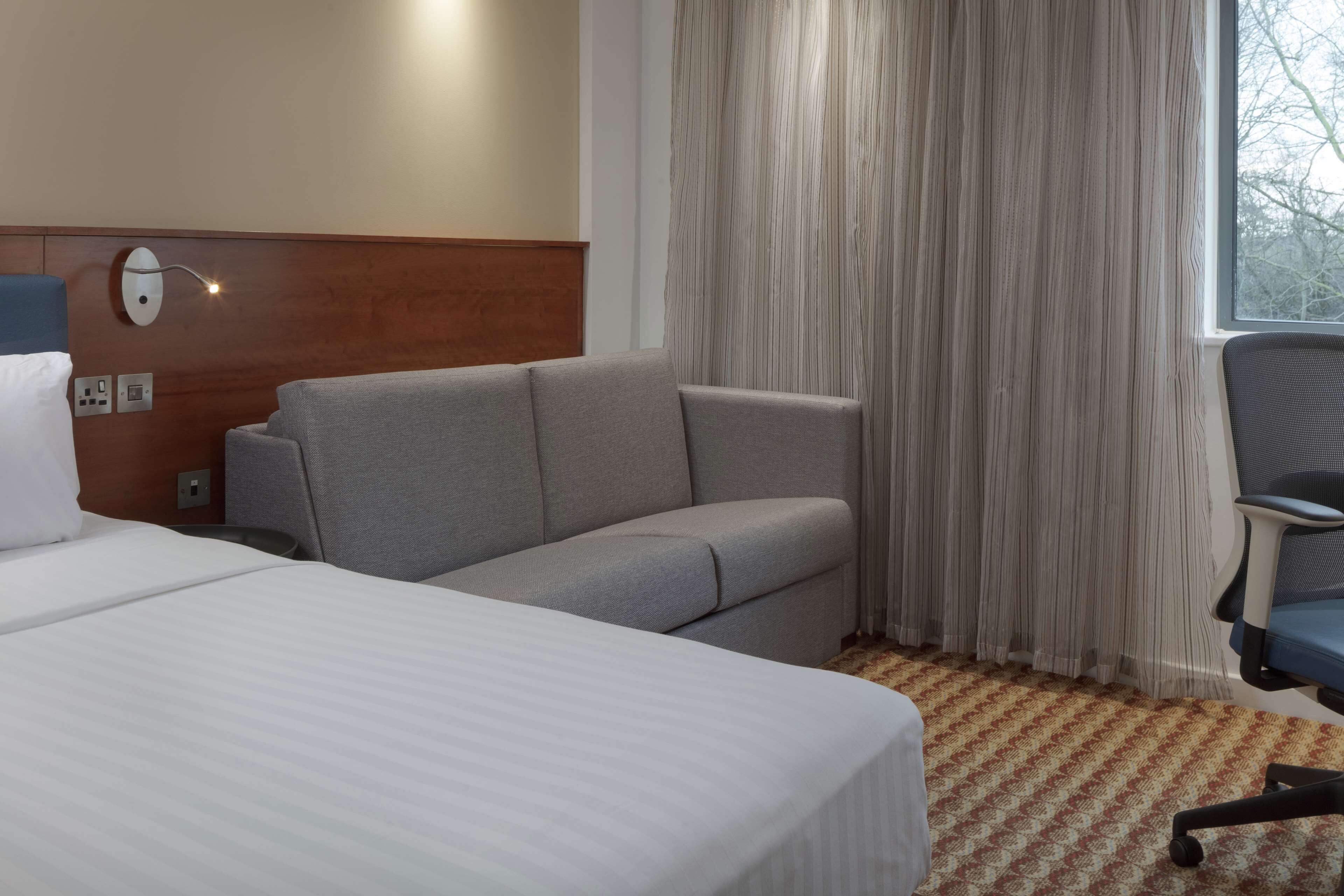 room, 1 queen bed with sofa bed, non smoking | in-room safe, desk, laptop workspace, blackout curtains