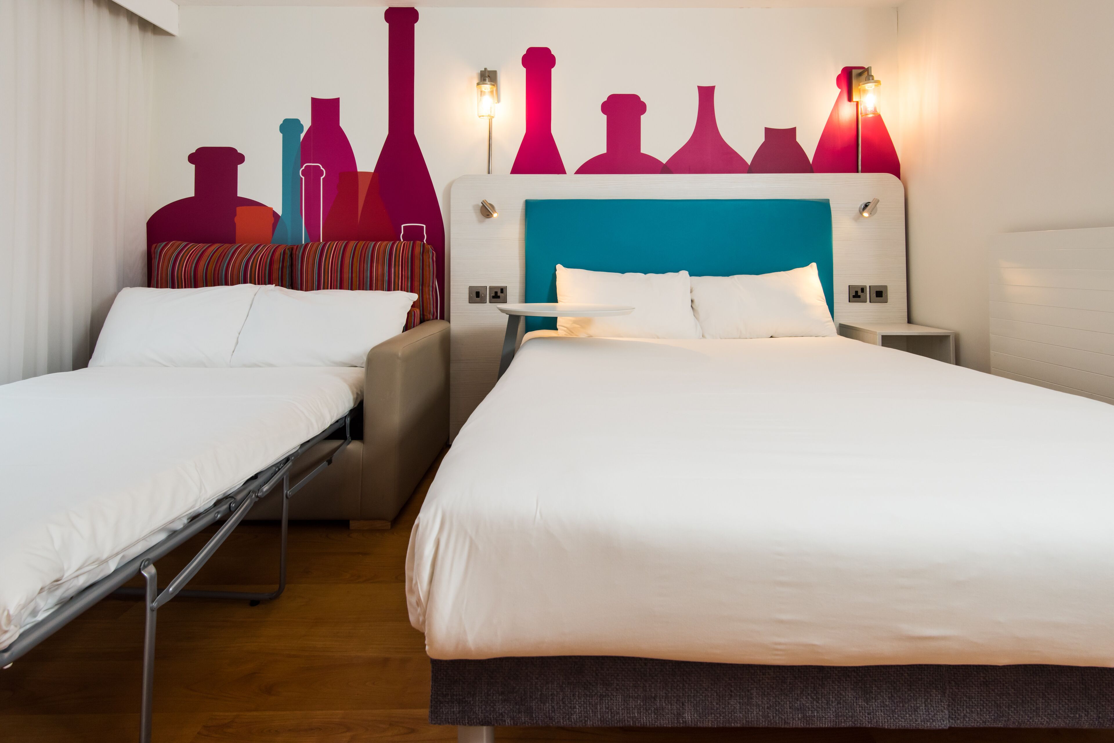 family room, 1 double bed with sofa bed (the family) | desk, blackout curtains, soundproofing, iron/ironing board