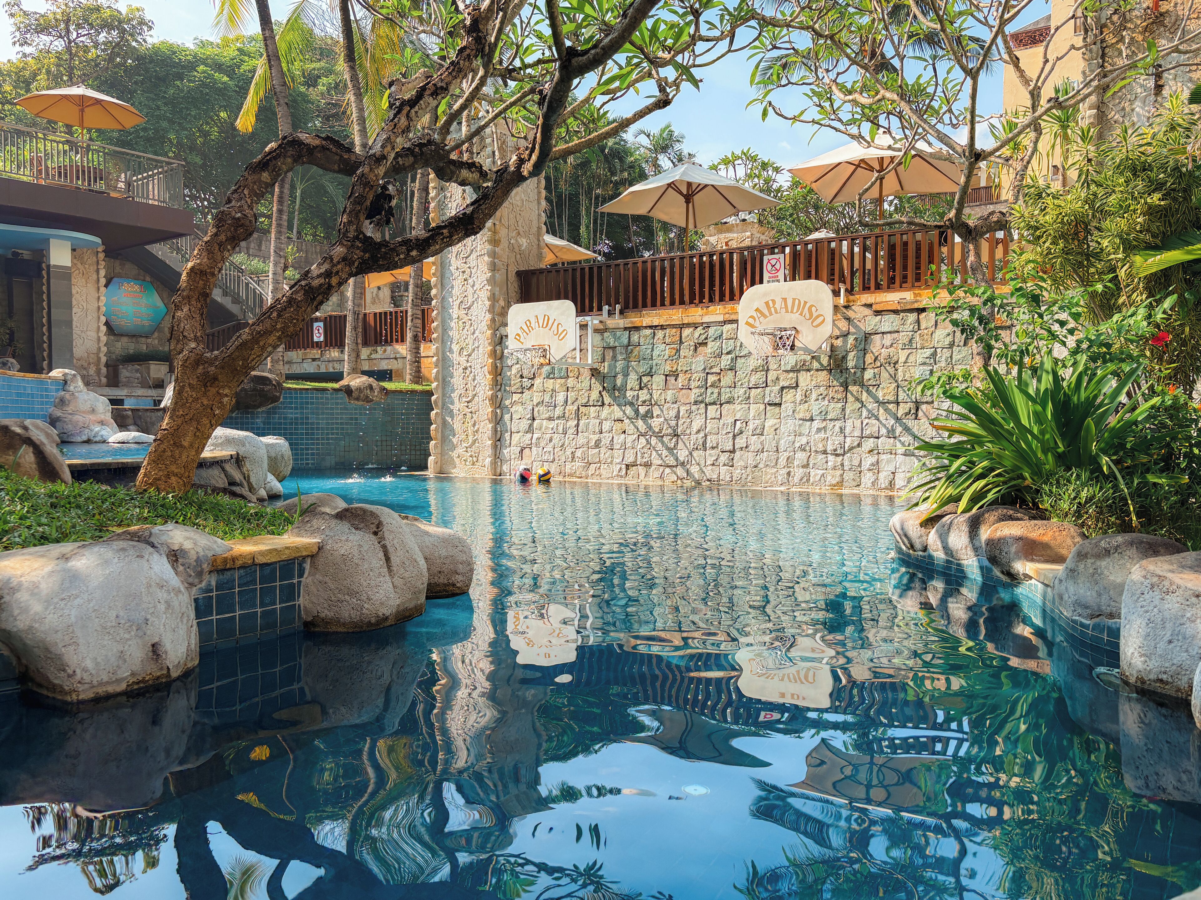 outdoor pool, open 8 am to 10 pm, pool umbrellas, pool loungers