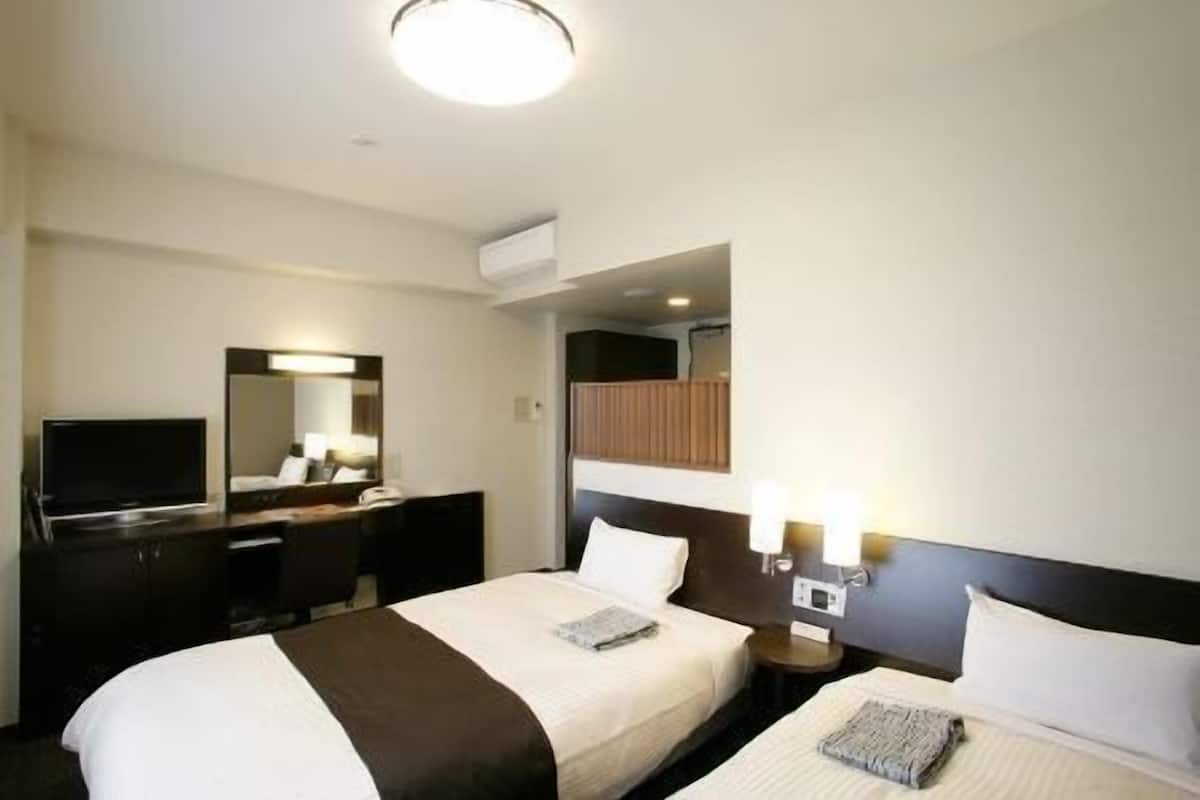 Desk, free WiFi, bed sheets
