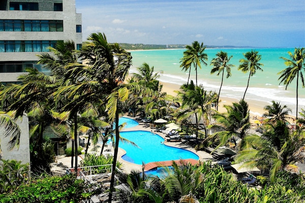 2 outdoor pools, open 6:00 AM to 8:00 PM, pool umbrellas, pool loungers