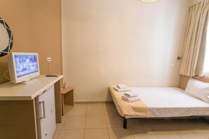 Fer et planche à repasser, Wi-Fi gratuit, draps fournis