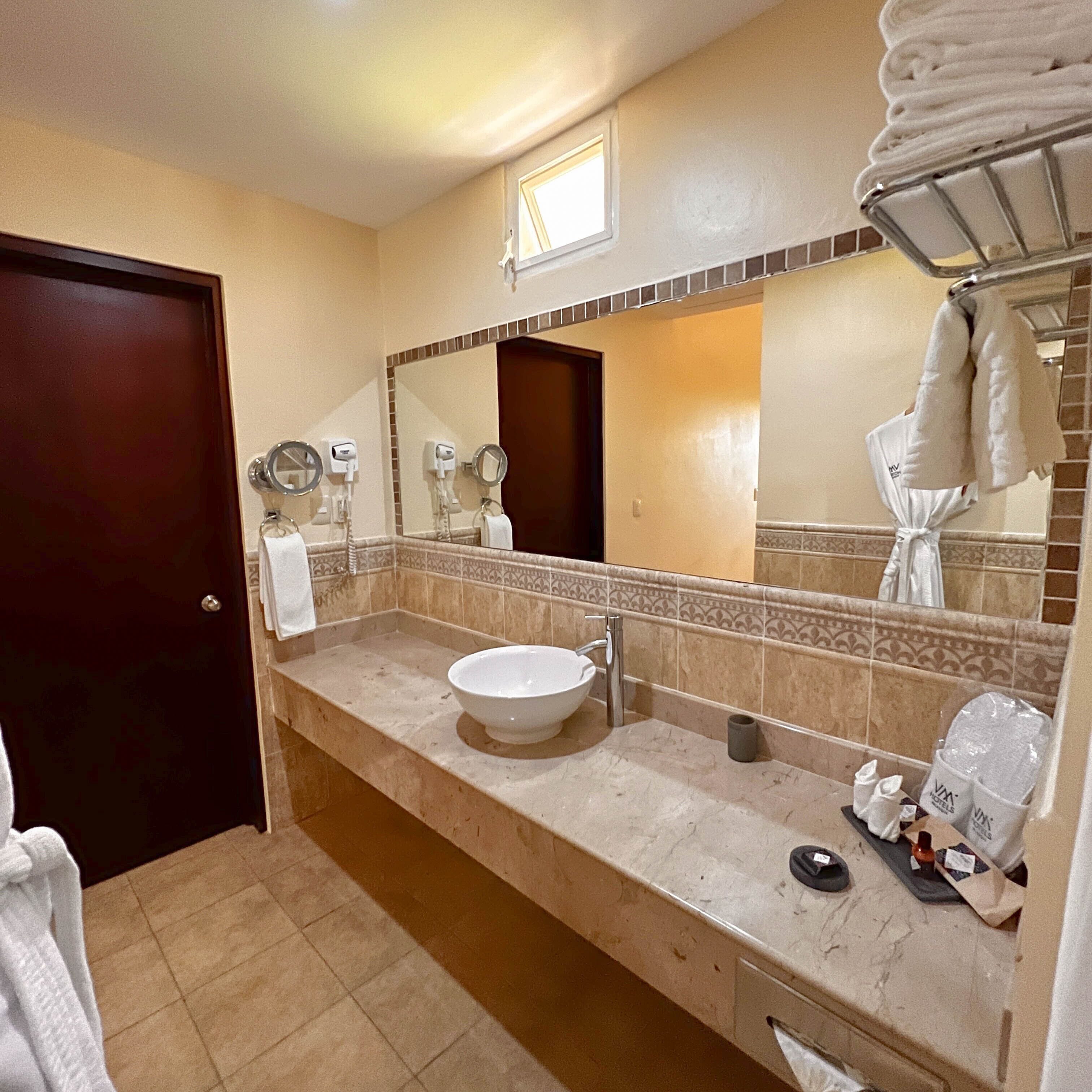 suite | bathroom | rainfall showerhead, free toiletries, hair dryer, towels
