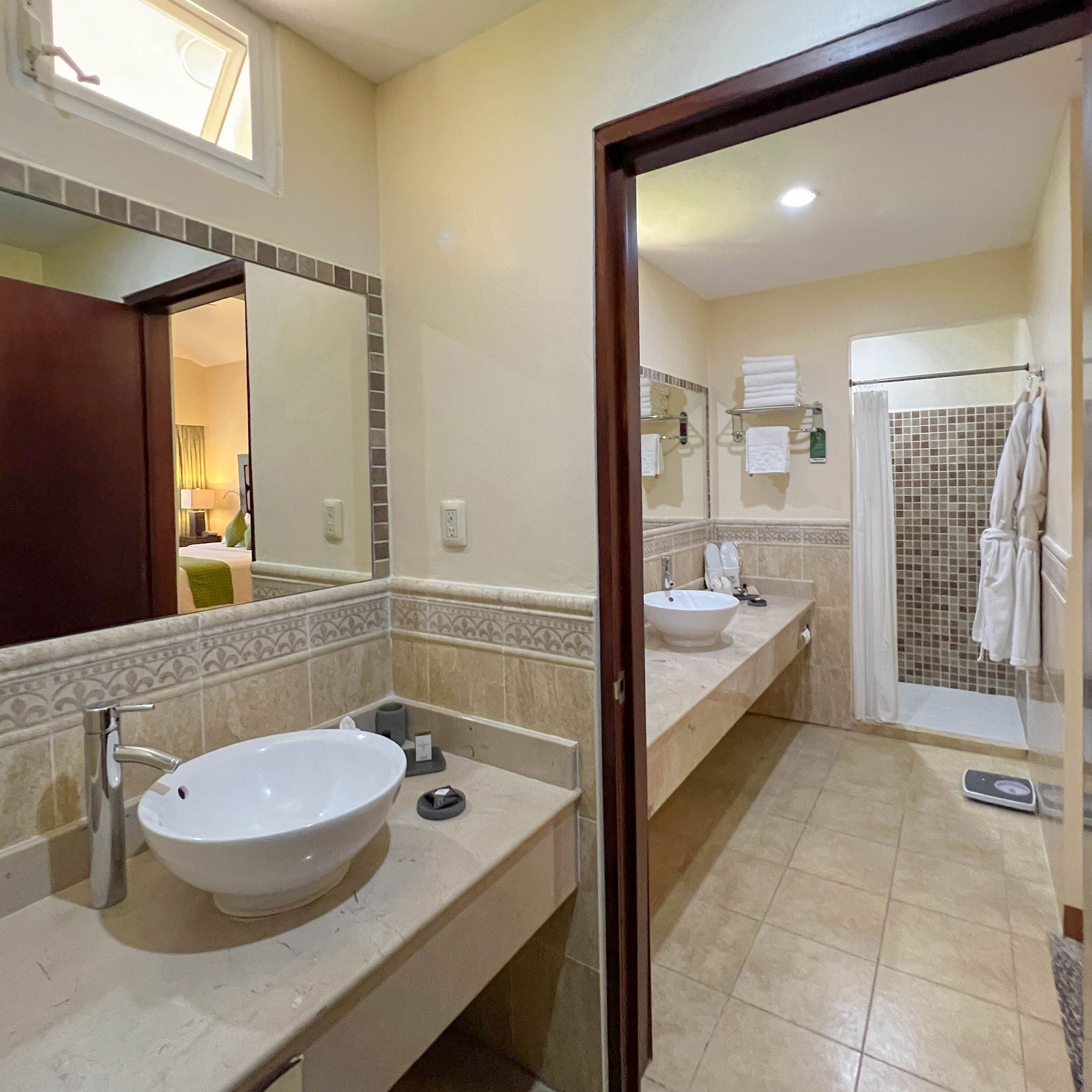 suite | bathroom | rainfall showerhead, free toiletries, hair dryer, towels