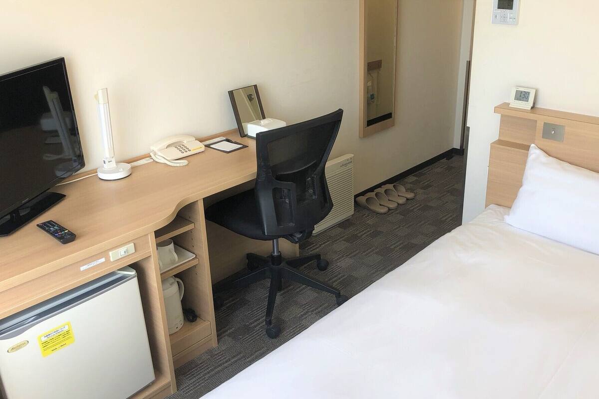 Desk, laptop workspace, blackout curtains, iron/ironing board