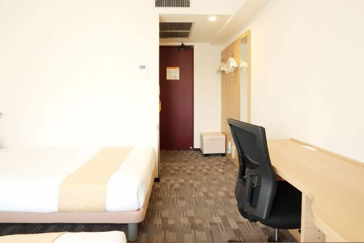 Desk, laptop workspace, blackout curtains, iron/ironing board