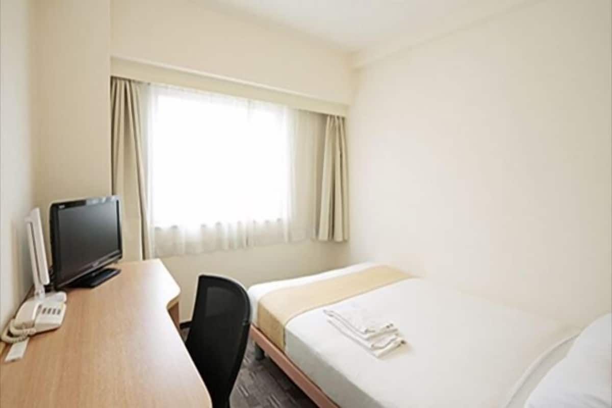 Desk, laptop workspace, blackout curtains, iron/ironing board