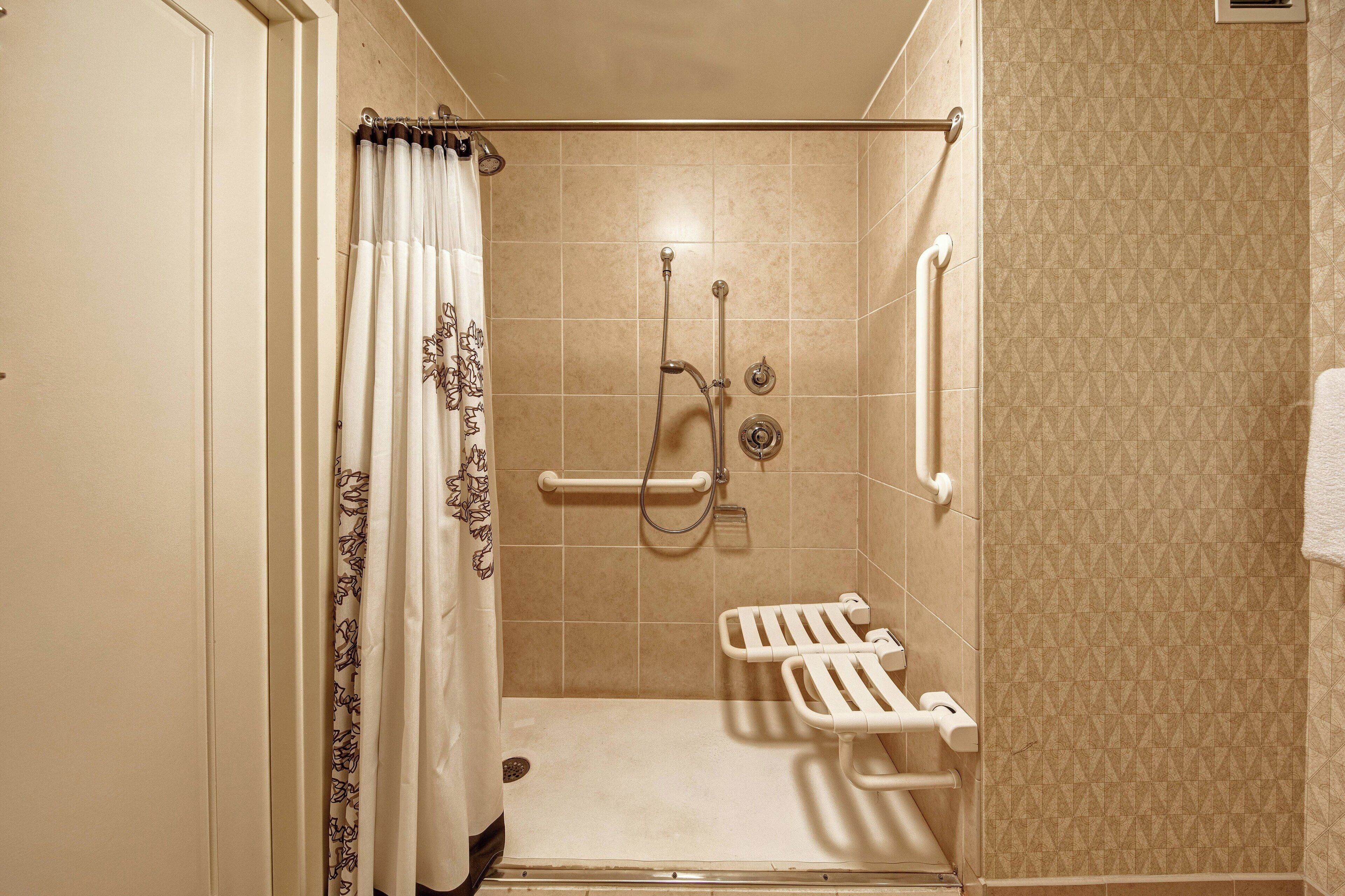 studio suite, 1 king bed with sofa bed, non smoking | bathroom | combined shower/bathtub, hair dryer, towels