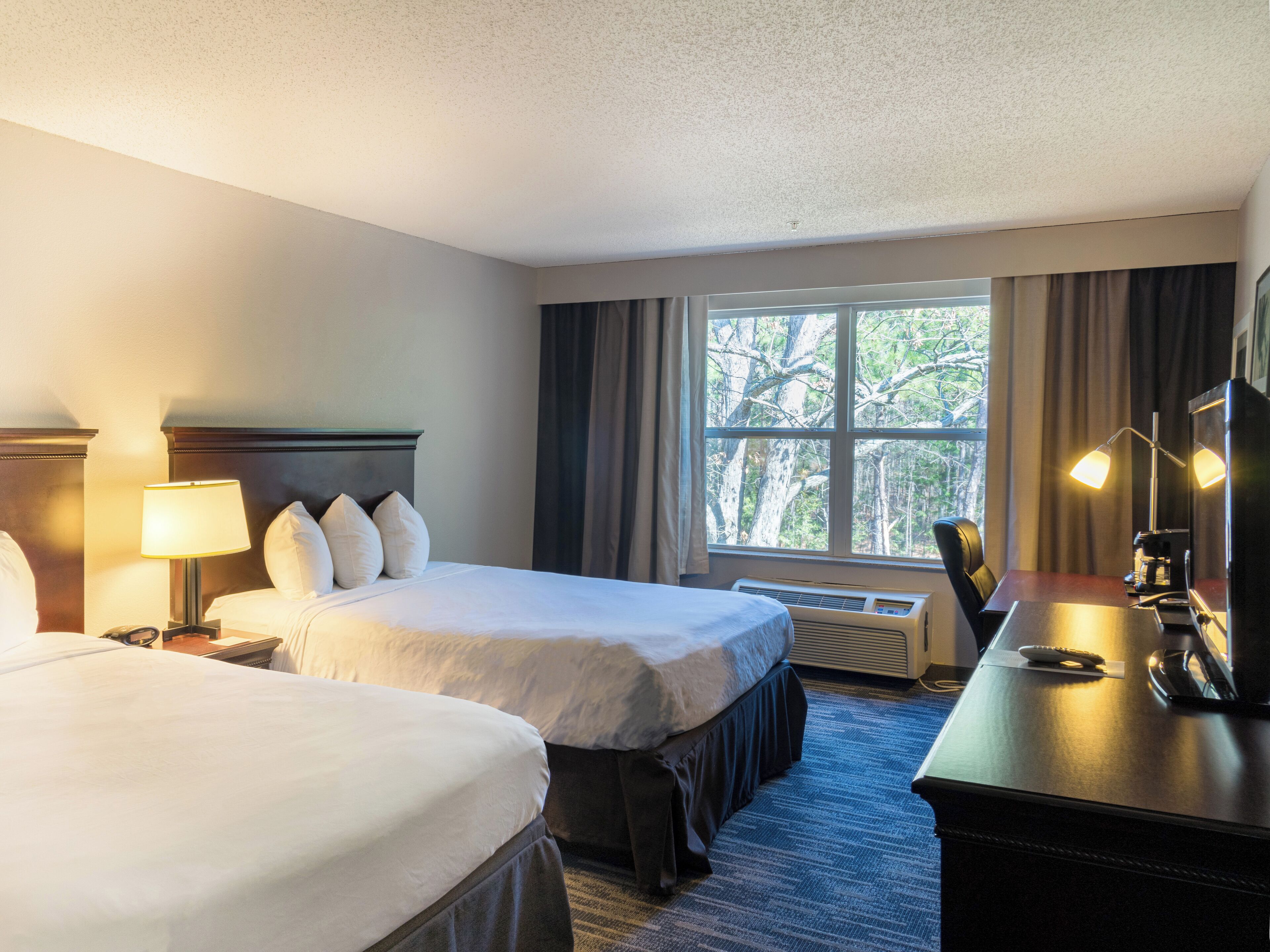 Desk, laptop workspace, blackout curtains, iron/ironing board