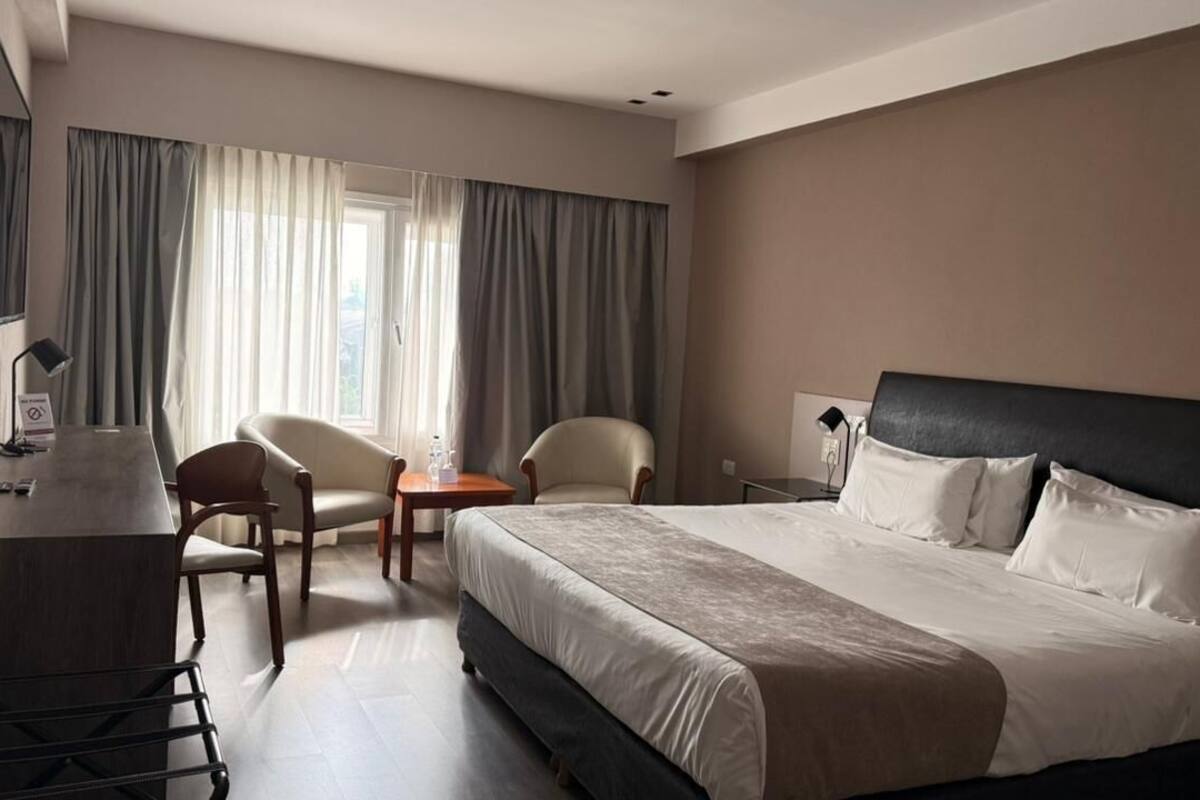 Superior Double Room | Minibar, in-room safe, desk, blackout curtains