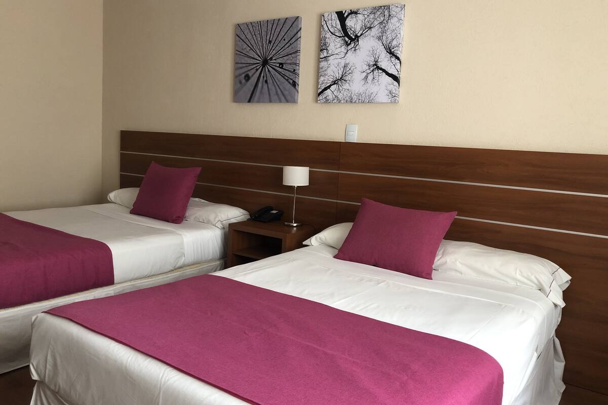 twin room | minibar, in-room safe, desk, blackout curtains