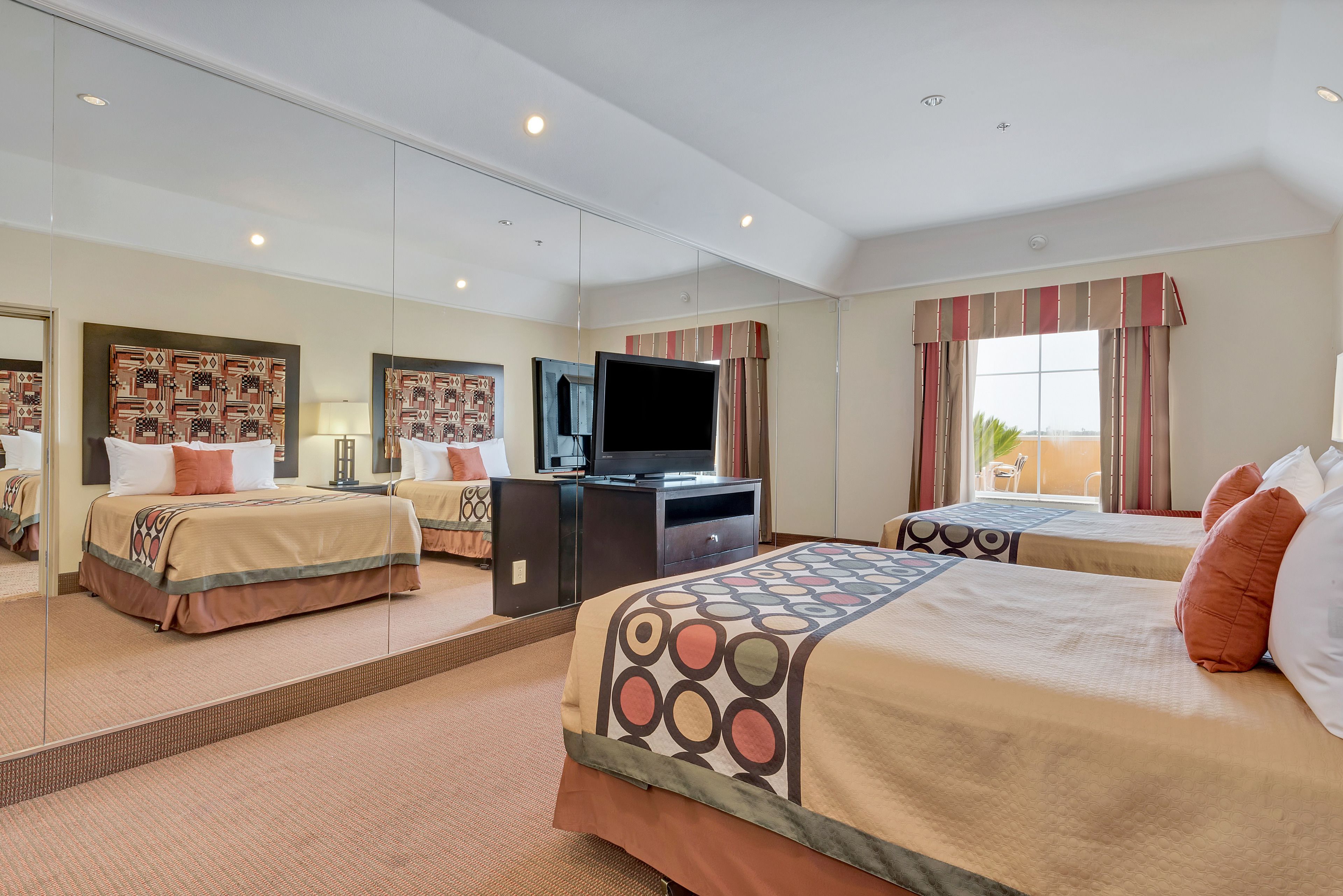 room, multiple beds, refrigerator | premium bedding, in-room safe, desk, soundproofing