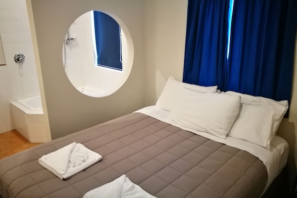 Blackout curtains, soundproofing, iron/ironing board