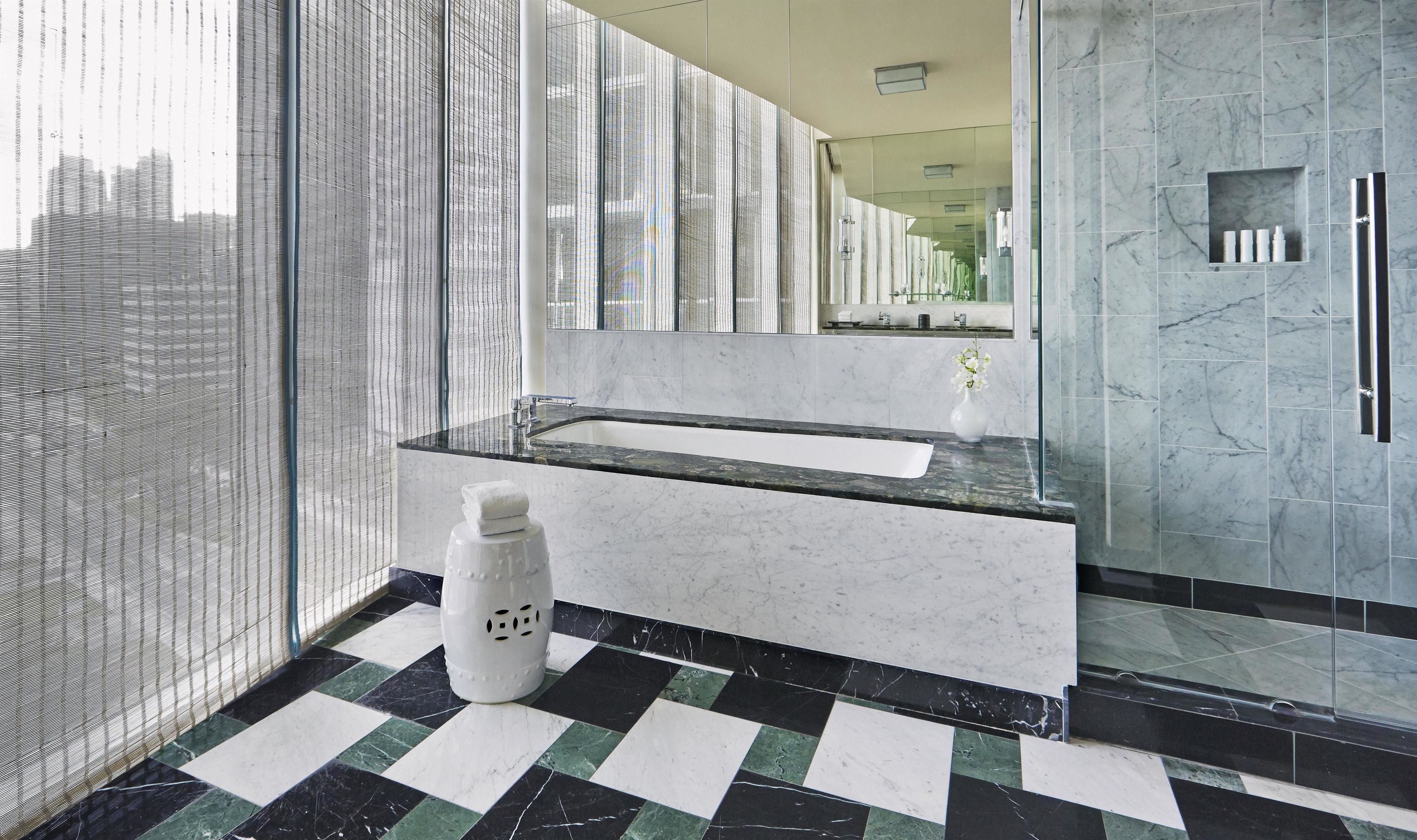 designer toiletries, hair dryer, bathrobes, towels