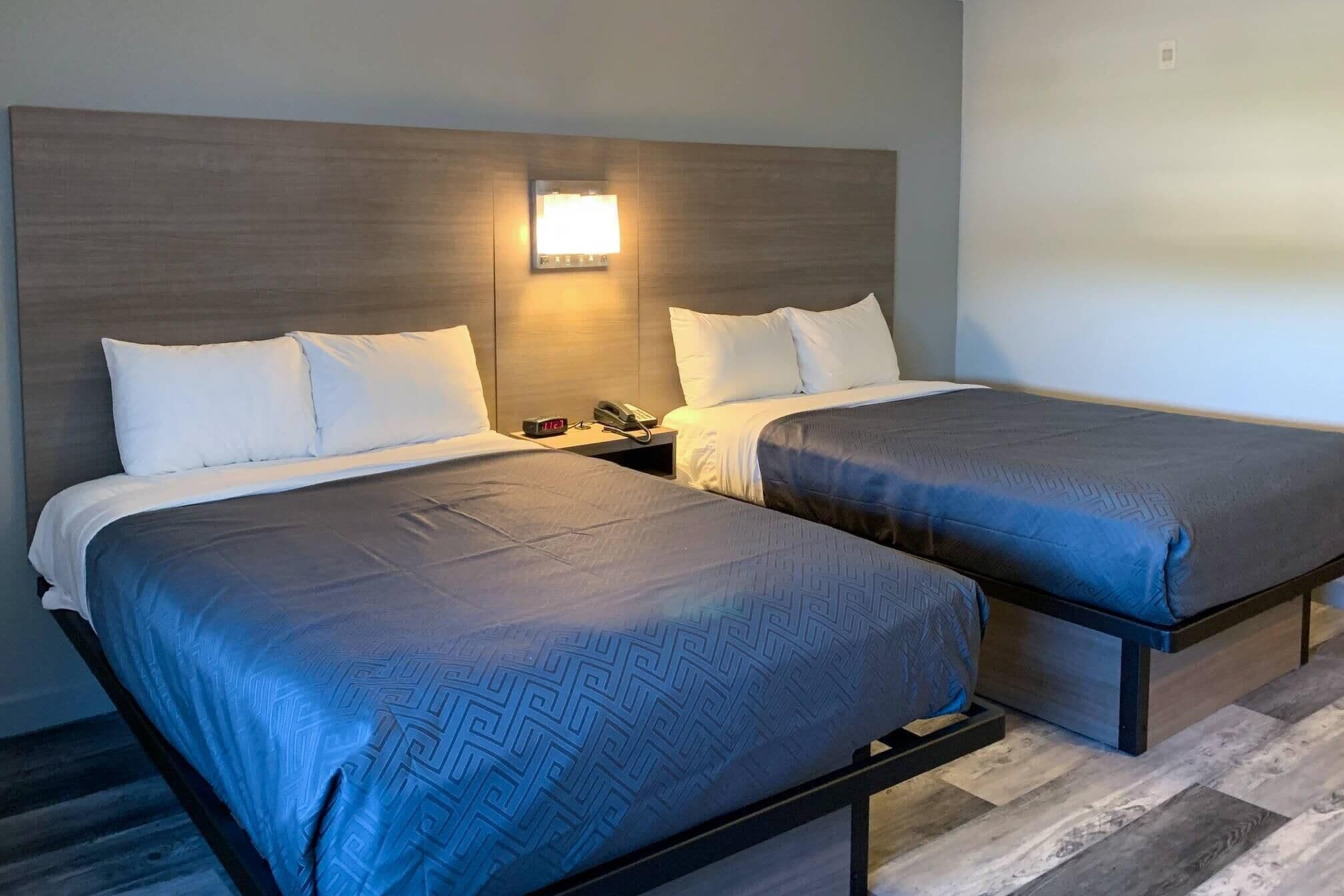 스위트, 싱글침대 2개, 금연 | 책상, 암막 커튼, 다리미/다리미판, 무료 유아용 침대