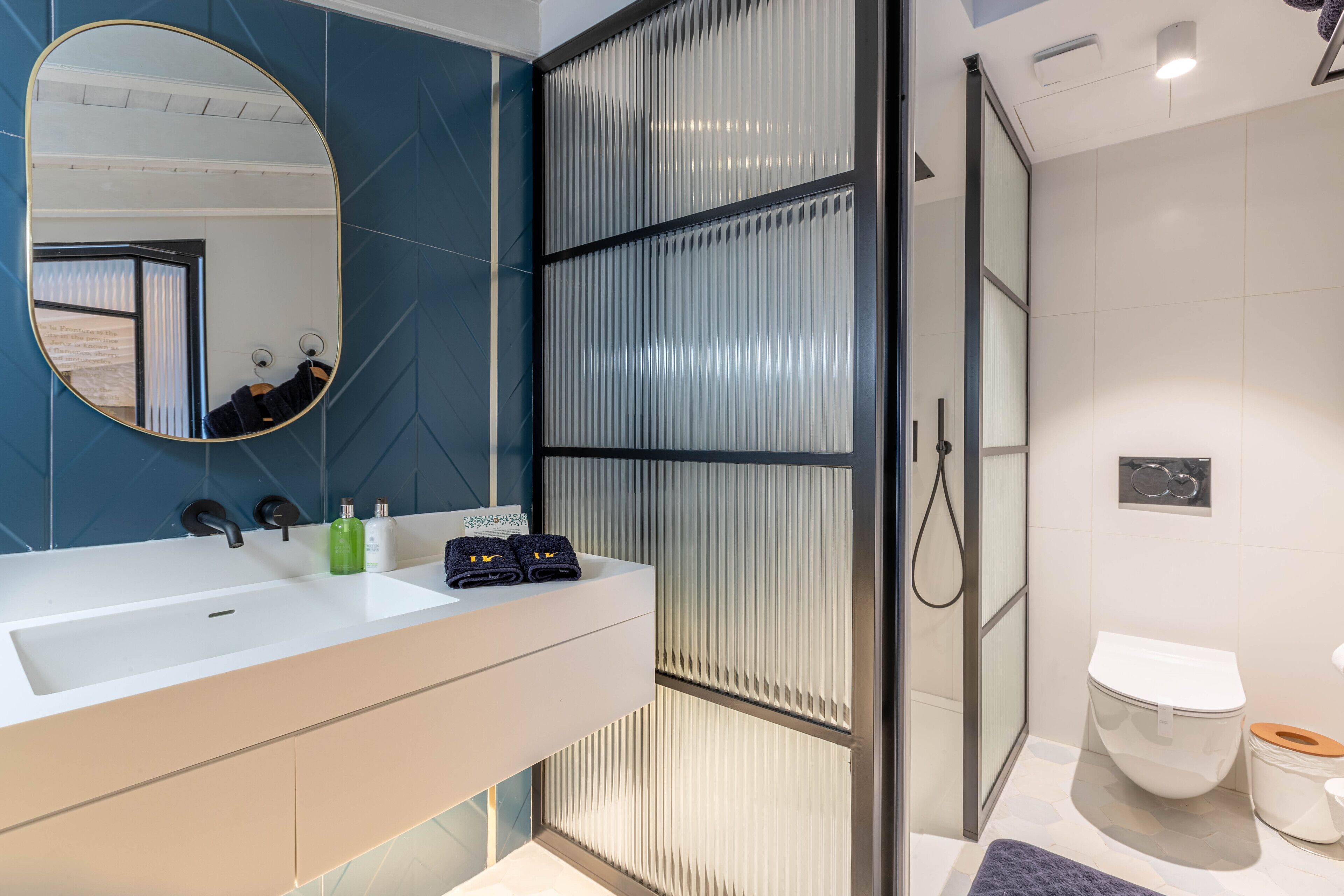 superior double room, 1 king bed, non smoking | bathroom | shower, rainfall showerhead, designer toiletries, hair dryer