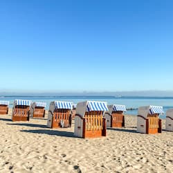 On the beach, white sand, beach towels
