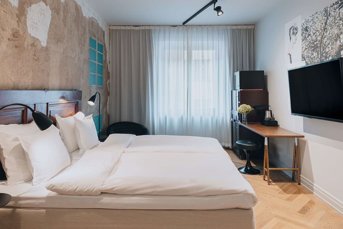 Premium bedding, pillowtop beds, in-room safe, individually decorated