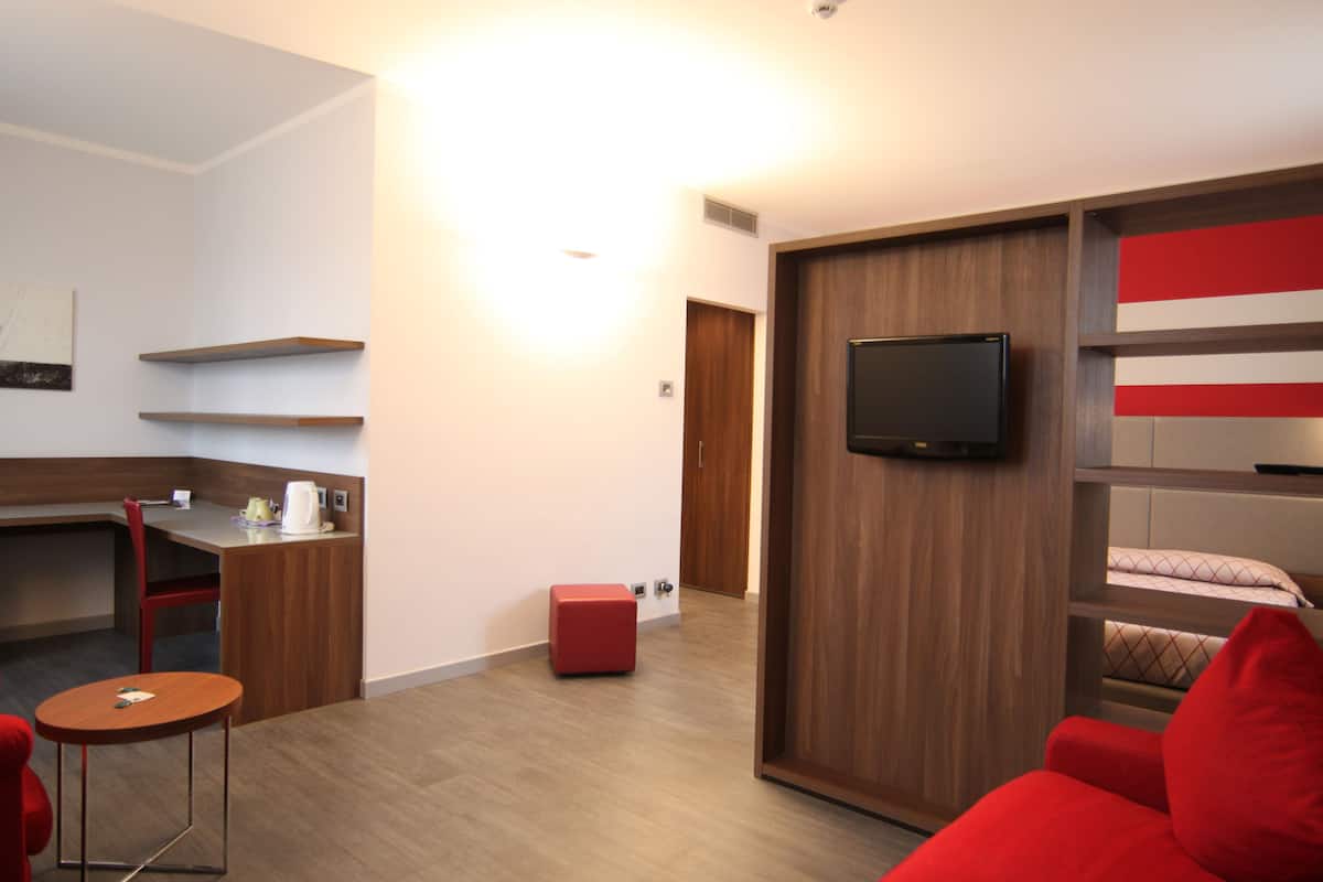 quadruple room | living area | lcd tv, pay films