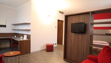 Chambre Quadruple | Coin séjour