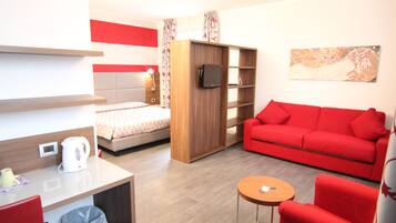 Camera quadrupla | Area soggiorno | TV LCD, film pay-per-view