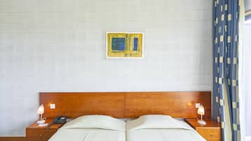 Kamar Triple | Minibar, brankas, tirai kedap cahaya, dan Wi-Fi gratis