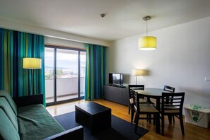 Standard Apartment, 2 Bedrooms | Living area | TV, ping pong, toys - Antillia Hotel (Ponta Delgada)