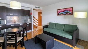 Standard Apartment, 2 Bedrooms | Living area | TV, table tennis, toys - Antillia Hotel (Ponta Delgada)