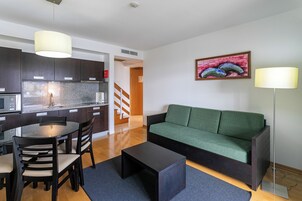 Standard Apartment, 2 Bedrooms | Living area | TV, table tennis, toys