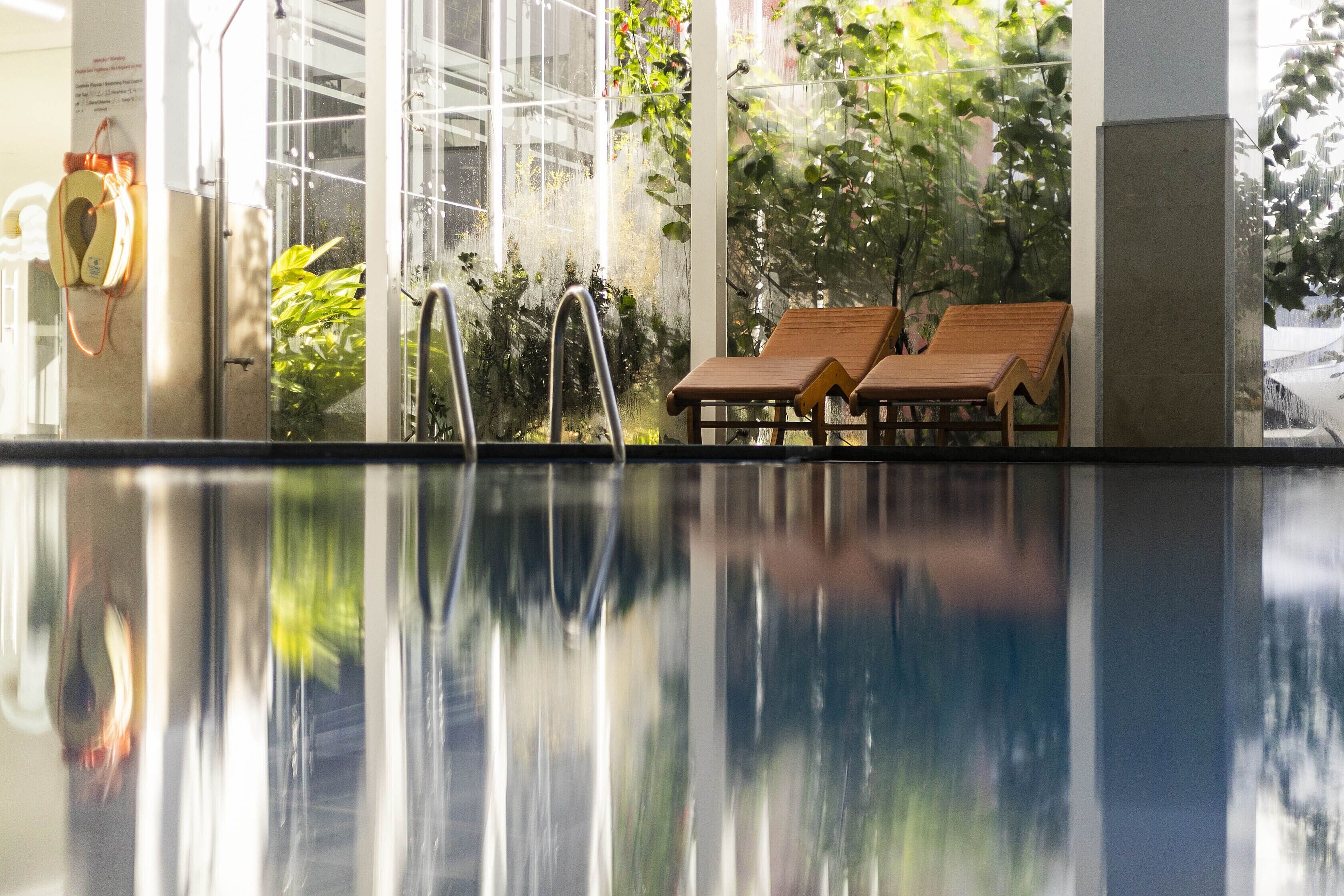 indoor pool, outdoor pool, pool loungers