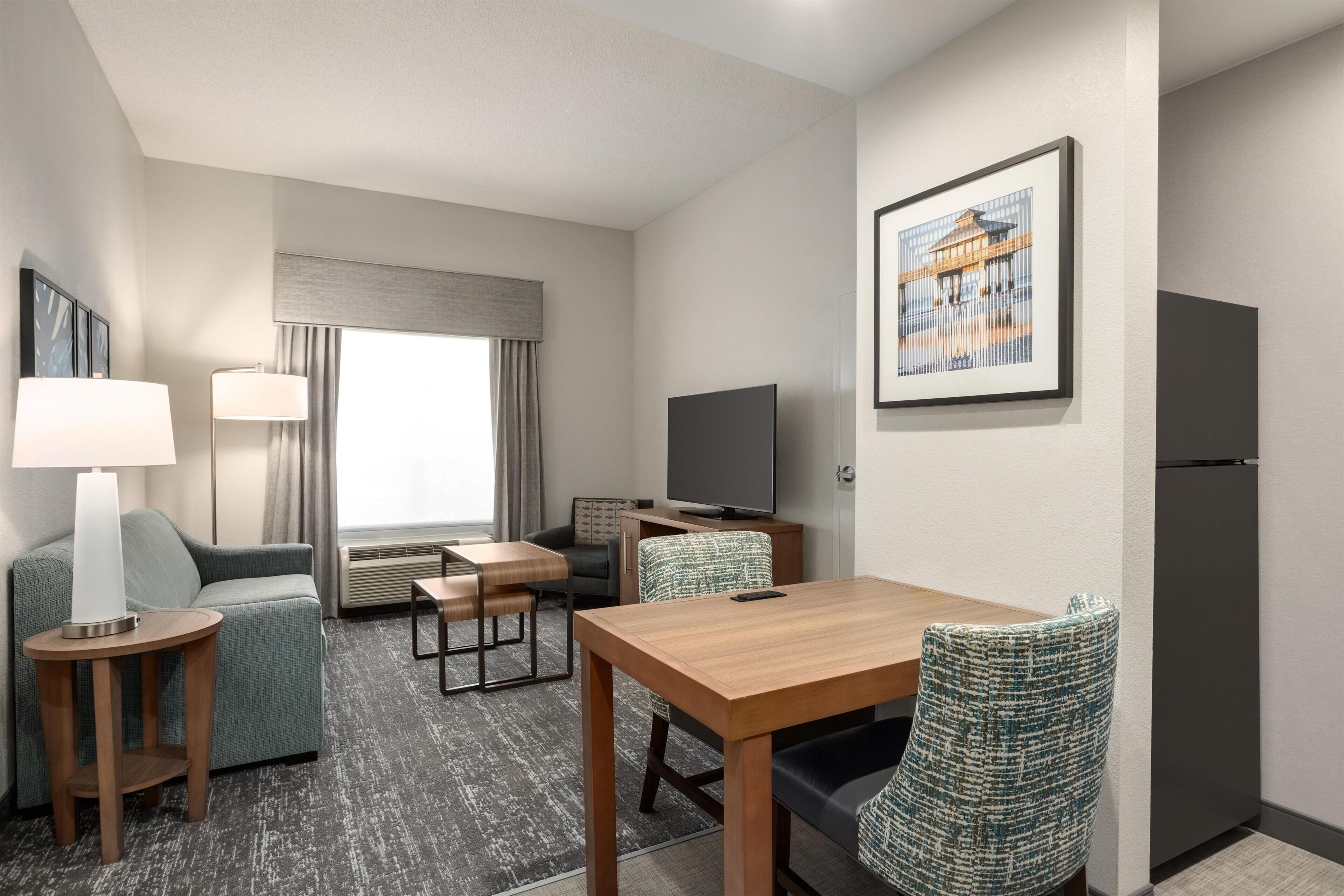 Premium bedding, pillow-top beds, desk, laptop workspace