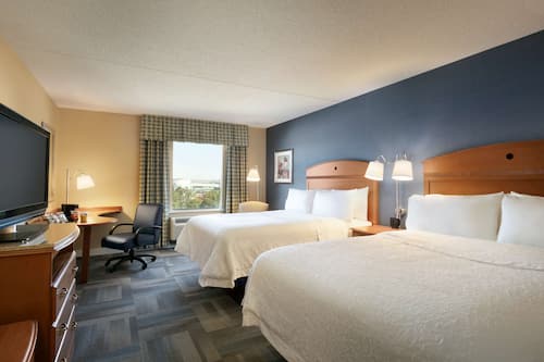Premium bedding, down duvets, pillow-top beds, in-room safe