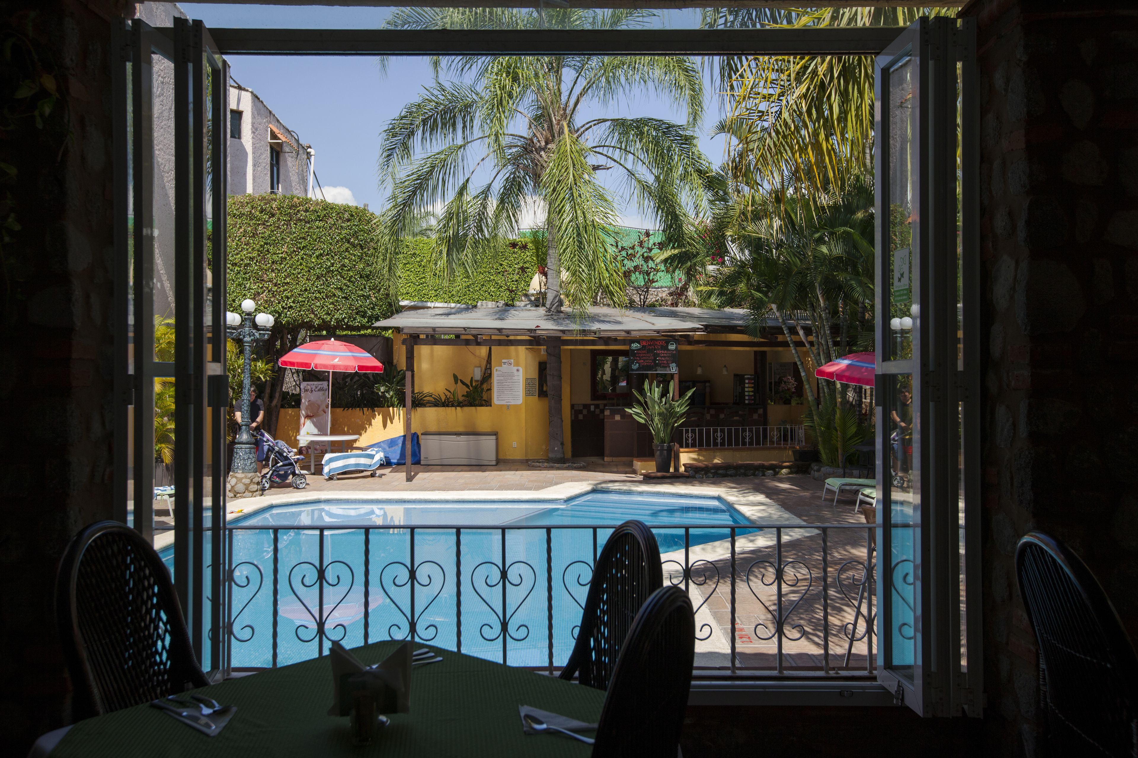 2 outdoor pools, pool umbrellas, pool loungers