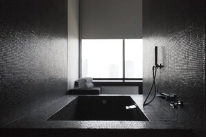 Master suite. | Bathroom | Rainfall showerhead, designer toiletries, hair dryer, bathrobes