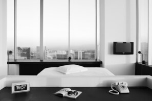 Ropa de cama de alta calidad, minibar, caja fuerte y escritorio