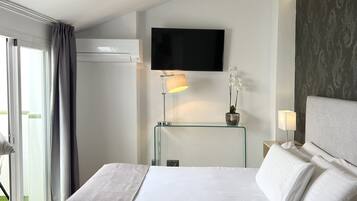 Quadruple Room | Premium bedding, down duvets, memory-foam beds, in-room safe