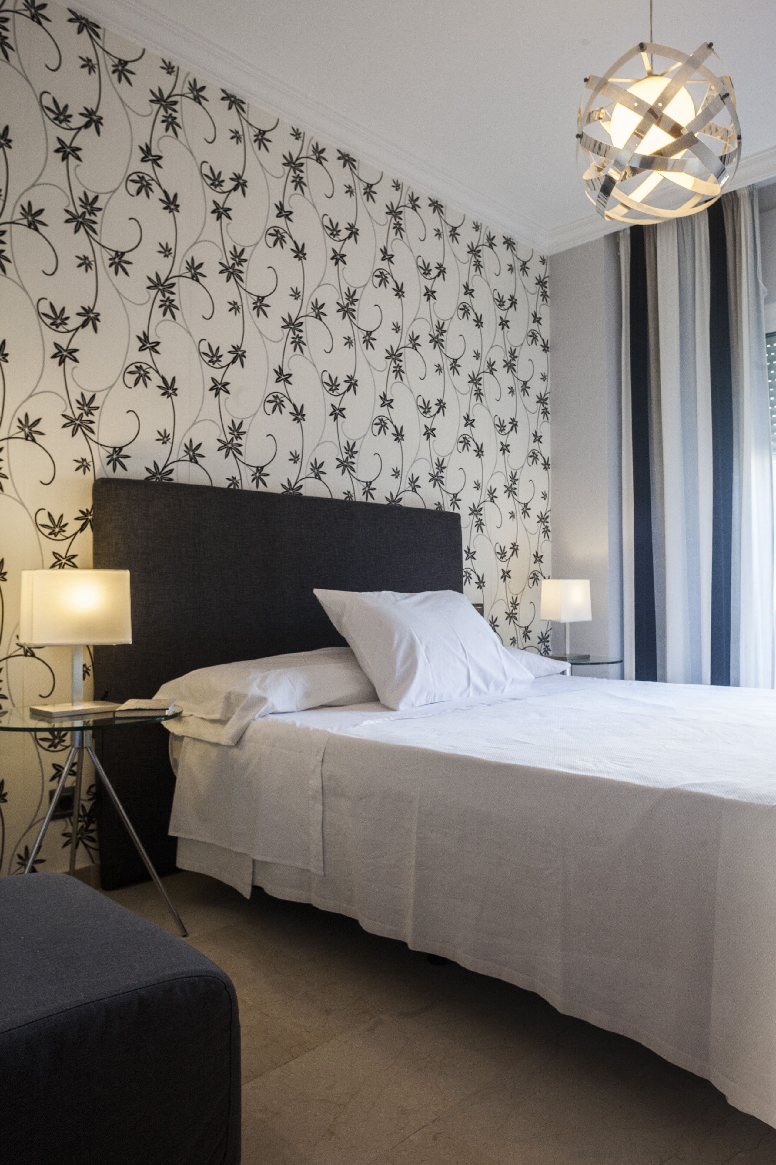 Premium bedding, down duvets, memory-foam beds, in-room safe