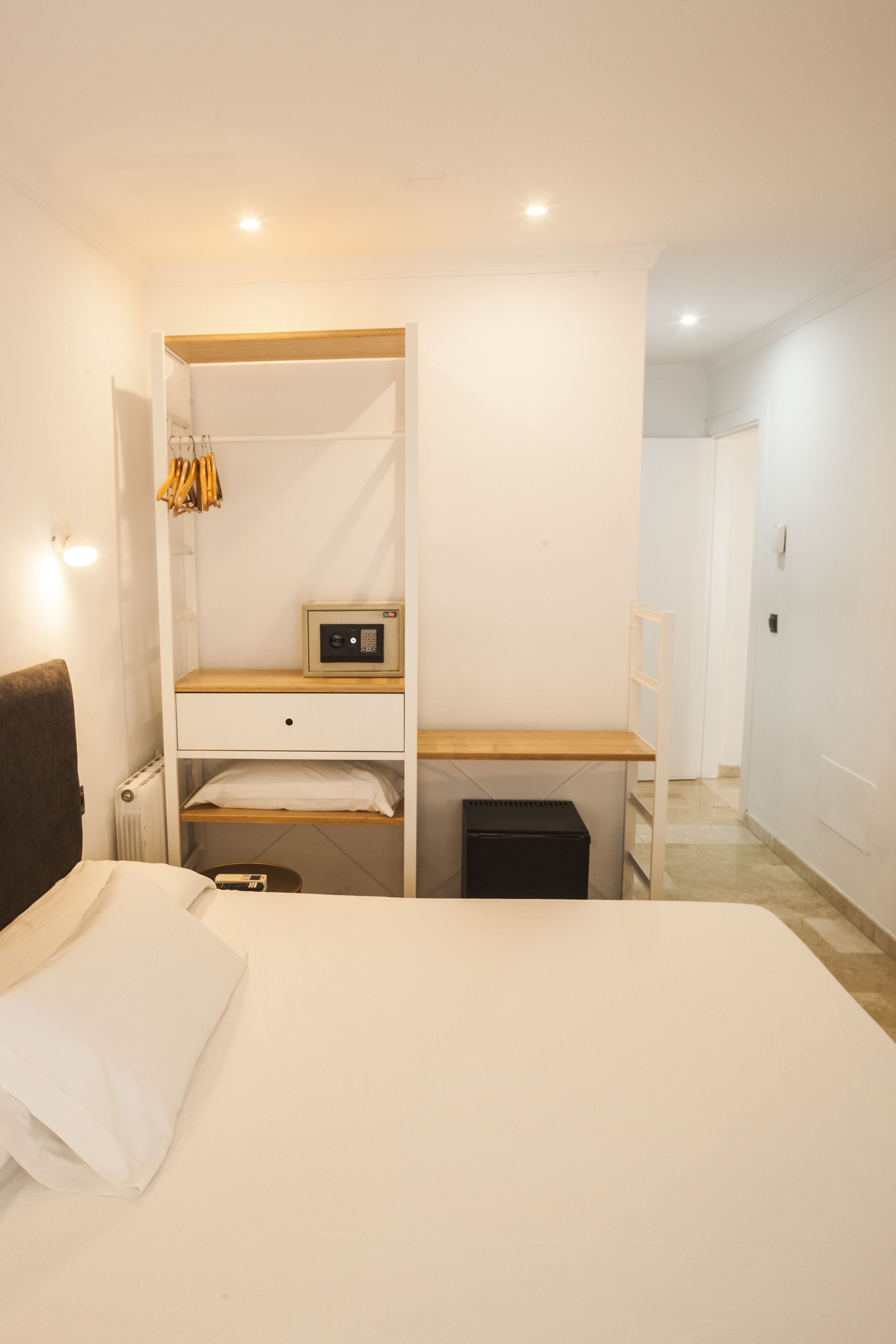 Premium bedding, down duvets, memory-foam beds, in-room safe