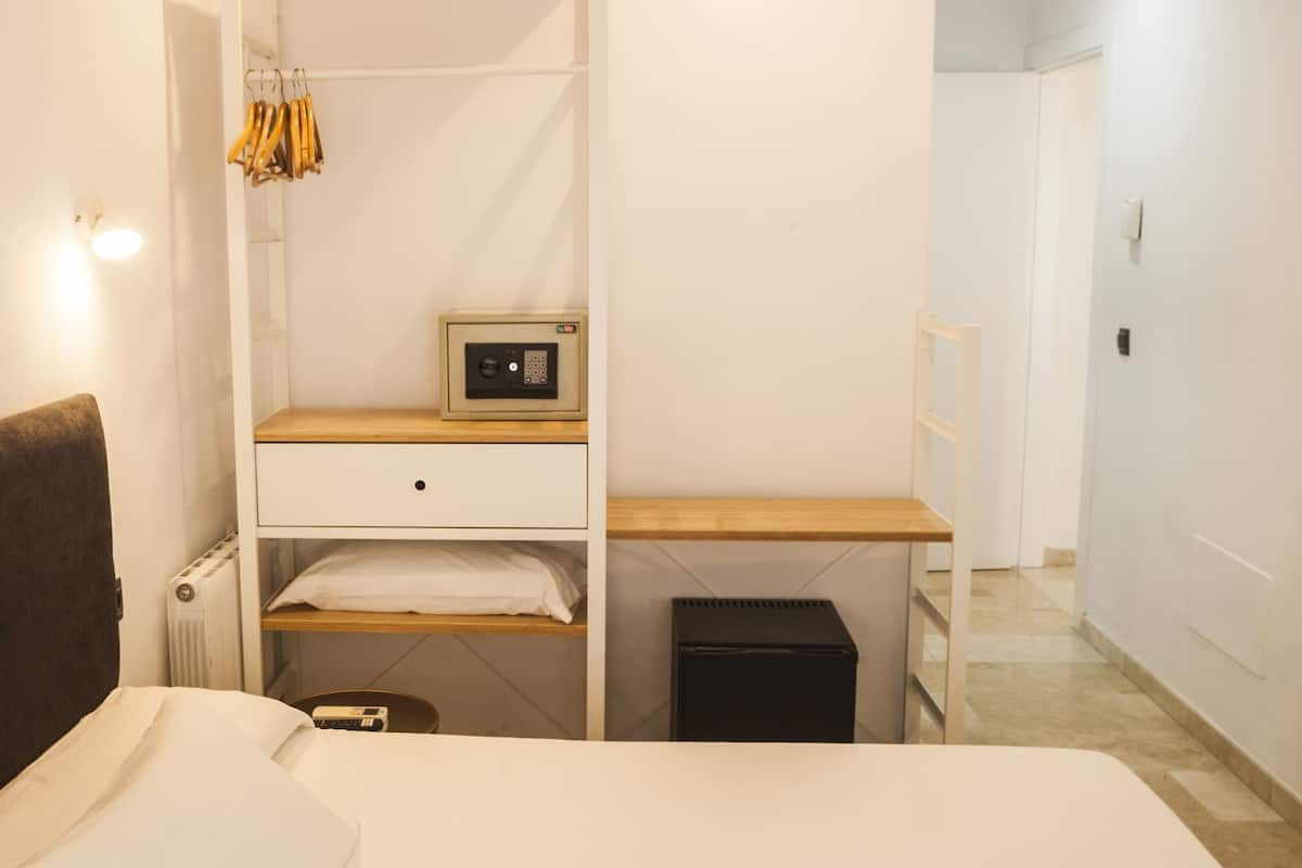 Premium bedding, down comforters, memory foam beds, in-room safe